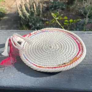 Handmade Cotton Rope Coaster. Mostly white, pink and blue added on the edges.